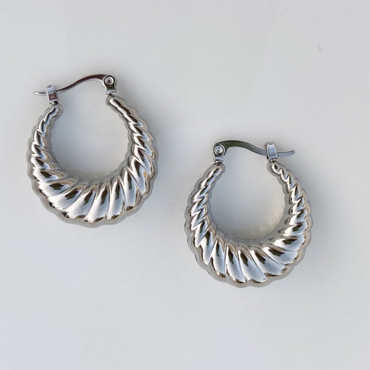 Silver twisted hoops